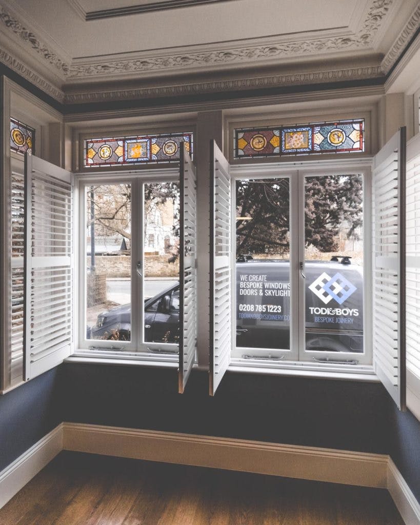 Bay-Window-with-Plantation-Shutterd-and-Stained-Double-Glazing-819x1024