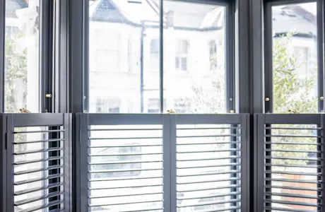 Bay-window-with-half-plantatioon-shutters-london-683x1024