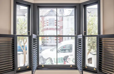 Open-plantation-shutters-for-bay-window-in-london-1024x683 (1)