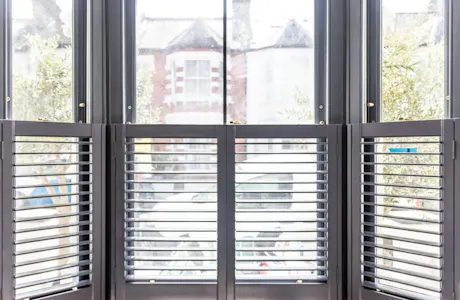 Open-wooden-plantation-shutters-for-sash-windows-1024x683