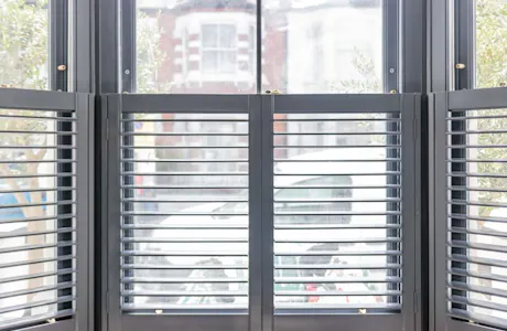 sash-window-with-half-plantation-shutters-1024x683