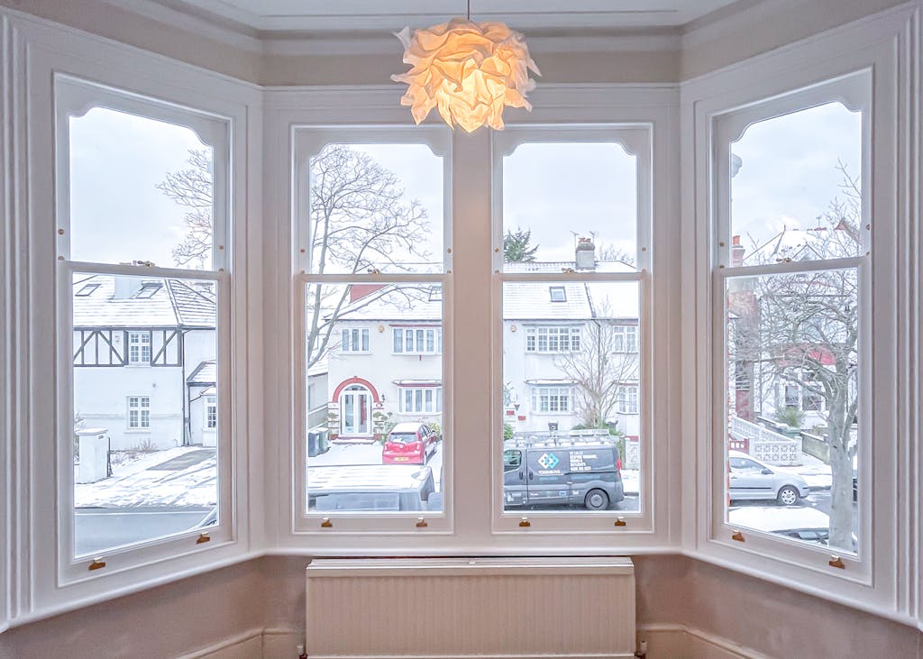 Bay Sash Window From Living Room Interior overlooking London street
