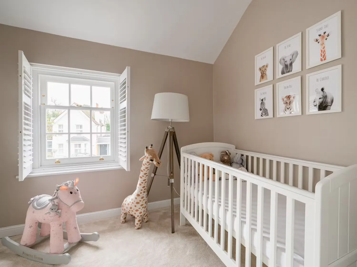 shutters on a sash window in a childs playroom